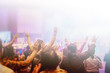 © Jantanee - Soft focus of Christian worship with raised hand,m