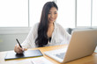 © Have a nice day  - Asian Business women creative graphic designer working on laptop color selection,she drawing on Digital graphics tablet at a workplace,Photographer draw,retouching image,Color swatch samples design