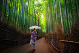 Fototapeta Dziecięca - Bamboo forest at Arashiyama with woman in traditional kinono and umbrella. Japan