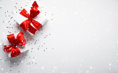 Wall Mural - merry christmas and happy holidays greeting card. new year. valentine's day. white gifts with red ri