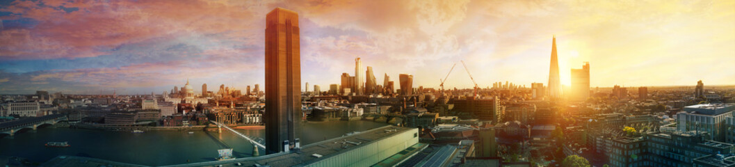 Poster - London view at sunset panorama. River thames, millennium bridge, St. Paul's cathedral, modern skyscrapers of the City, Canary Wharf at the background and Tate modern tower. UK, 2019