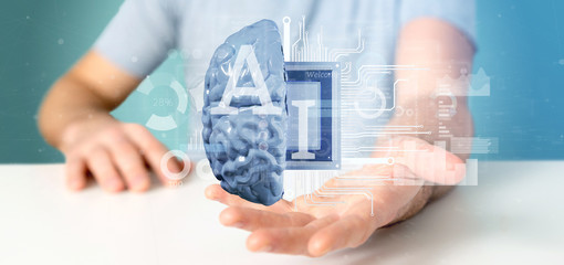 Wall Mural - business man holding artificial intelligence icon with half brain and half circuit 3d rendering