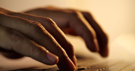 Businessman hands typing on laptop keyboard in office online. business computer design internet technology - 4K
