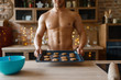 © Nomad_Soul - Nude man cooking pastry on the kitchen