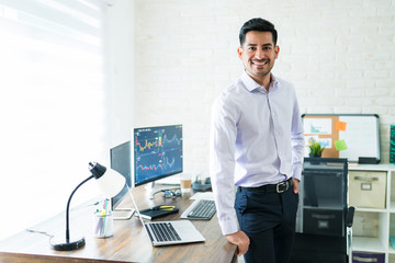 Wall Mural - attractive male finance professional working at home