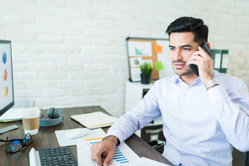 Wall Mural - young businessman working from home