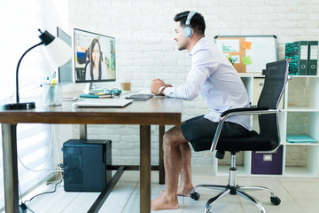 Wall Mural - taking conference call comfortably at home