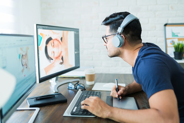 Wall Mural - attractive freelancer editing while working at home
