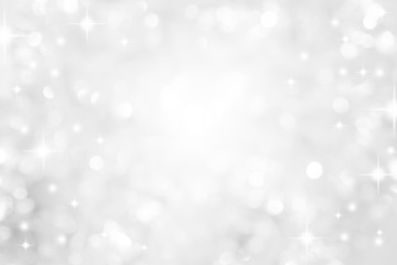 abstract blur white  and silver color background with star glittering light for show,promote and advertisee product and content in merry christmas and happy new year season collection concept	