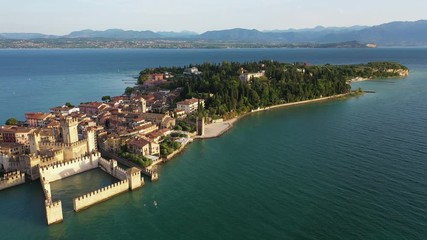 Wall Mural - Aerial view of the city of Sirmione. Lake Garda Italy. The film was shot with drone