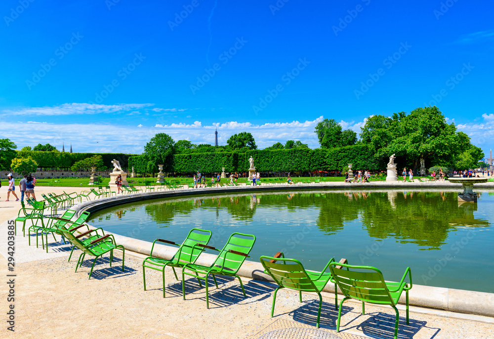 Tuileries Garden is public garden between Louvre Museum and Place de la Concorde in Paris, France - obrazy, fototapety, plakaty 