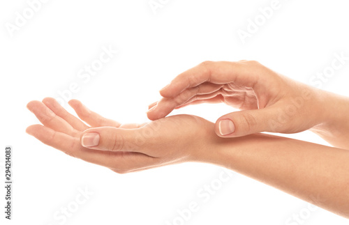 Young woman showing hands on white background, closeup Canvas Print