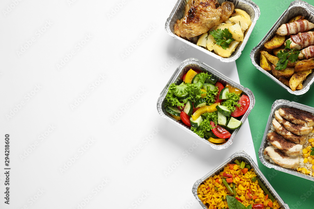 Lunchboxes on color table, flat lay. Healthy food delivery - obrazy, fototapety, plakaty 