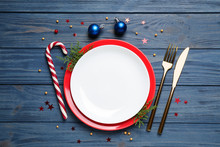 Beautiful Christmas Table Setting On Blue Wooden Background, Flat Lay