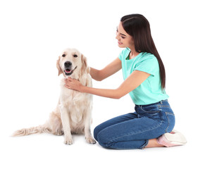 Canvas Print - Young woman and her Golden Retriever dog on white background