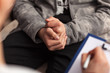 © Ilike - Young teenager boy at counseling - close up on hands