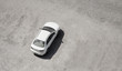 white car parked in the sand. aerial view