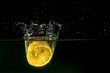 Lemon splashing into water