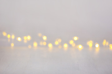 closeup view of white table with blurred lights