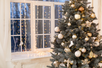 christmas tree background. new year composition with spruce and lights. close up image of christmass