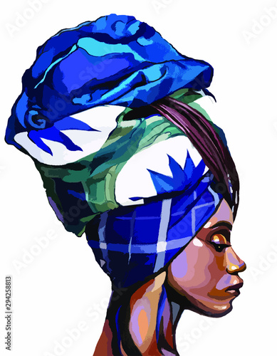 Fotomural Attractive young woman's profile in turban with her eyes looking down
