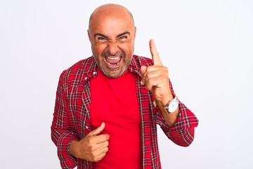 Middle age handsome man wearing casual shirt standing over isolated white background pointing finger up with successful idea. Exited and happy. Number one.