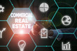 © Zofia - Writing note showing Commercial Real Estate. Business concept for Income Property Building or Land for Business Purpose Male human wear formal suit presenting using smart device