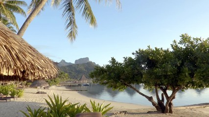 Wall Mural - Bora Bora beach vacation paradise island with overwater bungalows resort hotel and beach hut in coral reef lagoon ocean and beach. Mount Otemanu, Bora Bora, French Polynesia, Tahiti, South Pacific.