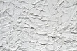© marketlan - Decorative gray plaster effect on wall. Plaster texture. Closeup