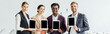 © LIGHTFIELD STUDIOS - panoramic shot of our multiethnic colleagues holding digital tablets and smiling in conference hall