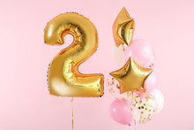 Figure 2 And Different Balloons On Color Background