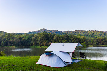 morning landscape for camping tent in a forest camp near the lake