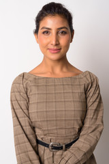 Portrait of young beautiful Persian woman looking at camera