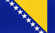 Bosnia and Herzegovina national fabric flag textile background.
