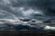 © Janis Smits - Dark clouds over Baltic sea.