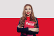 Happy girl on the Poland flag background. Travel and learn polis