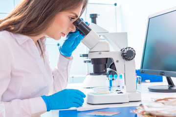 Wall Mural - Young woman in food quality control lab