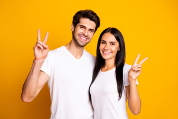 Poster - Photo of amazing marriage pair showing v-sign symbols wear casual outfit isolated yellow color background