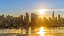 Midtown Manhattan Skyline At Sunrise In New York, Timelapse Of Rising Sun