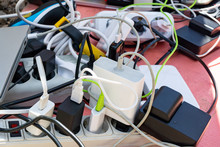 Bunch Of Charging Gadgets, Electronic Devices, Messy Wires. Dependence On Electricity