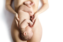 Cute Newborn Baby Lying On The Mother Belly