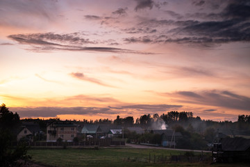 Natural Belarus village in light of sunset