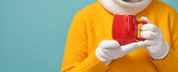 Sticker -  woman holding a cup of warm drink