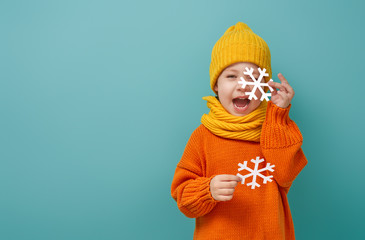 Wall Mural - Winter portrait of happy child