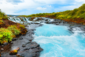 Wall Mural - Bruarfoss waterfall with blue water, southern Iceland. Summer landscape. Famous travel destination