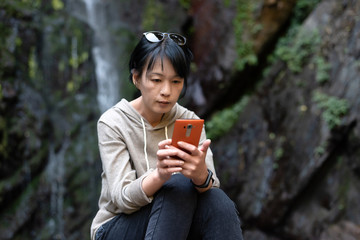 Poster - Asian woman using mobile phone