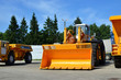 © MaxSafaniuk - Large front-end loader or all-wheel bulldozer manufacture by the heavy vehicle plant. New heavy quarry equipment with bucket for sales. Coal mining, granite, gravel, sand.