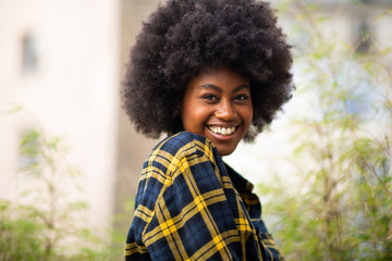 Sticker - Close up horizontal smiling young black woman with afro hair