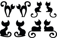 Dark Silhouettes Of Cats On A White Background