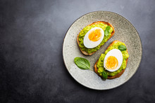 Healthy Breakfast, Toast With Avocado And Egg, Top View, Copy Space. Vegetarian Food Concept